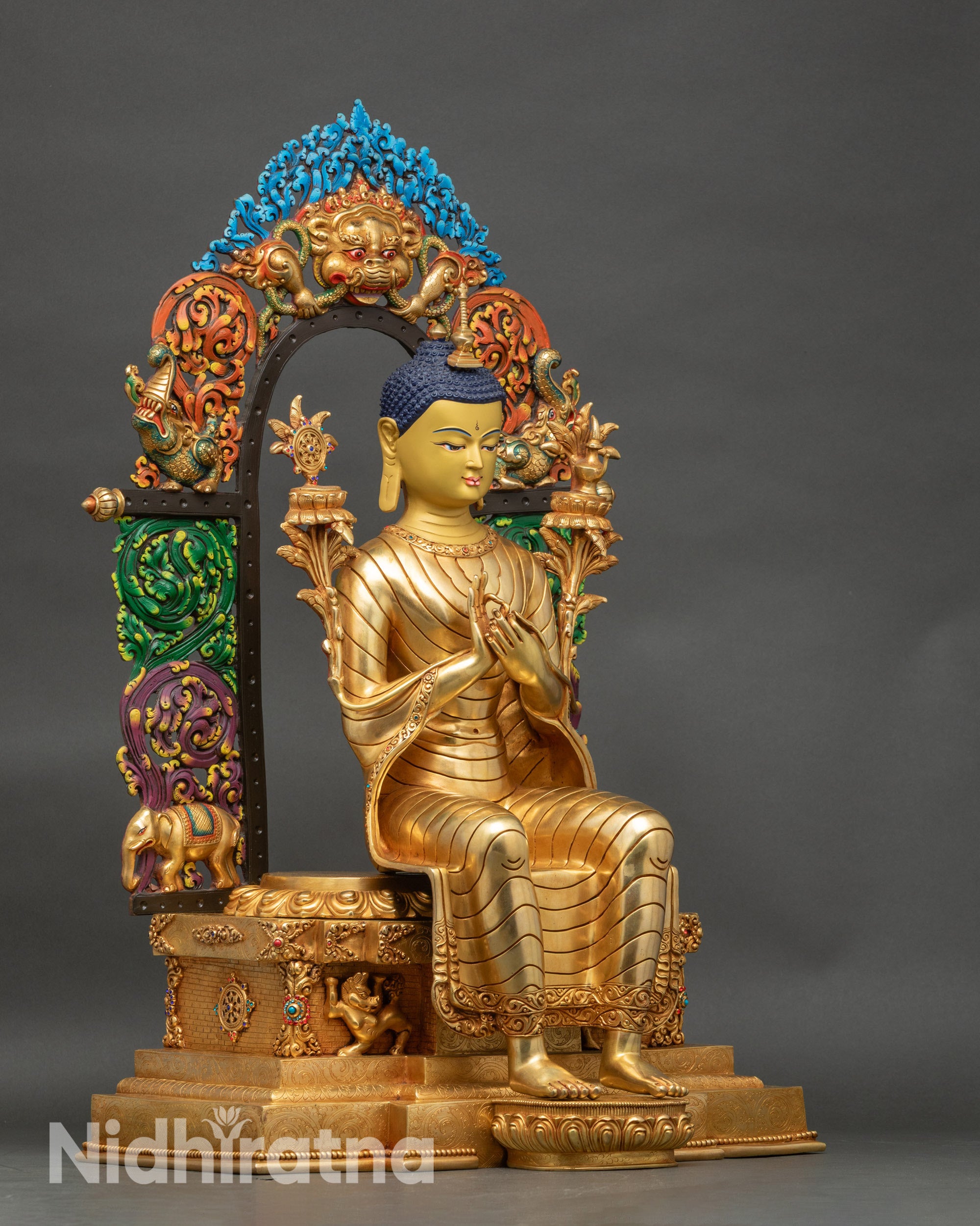 Right side view Maitreya Buddha statue, gold‑gilded copper, Dharmachakra mudra and lotus seat details