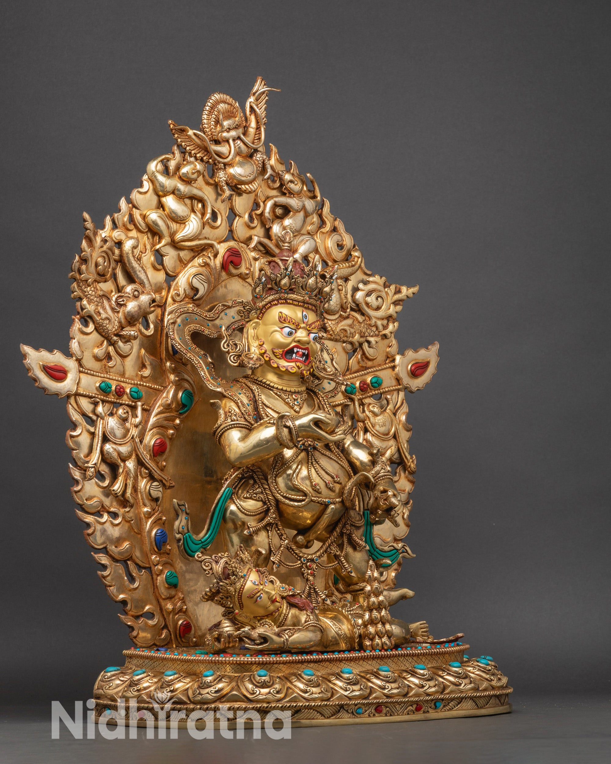 Right side view of Black Dzambhala statue, handmade Newari copper deity for wealth and abundance