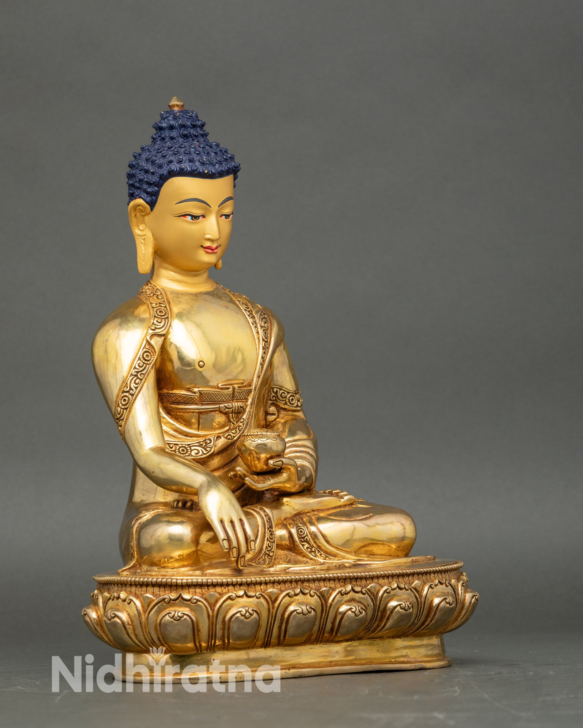 Right side view of Buddha statue, fire-gilded copper Himalayan artwork