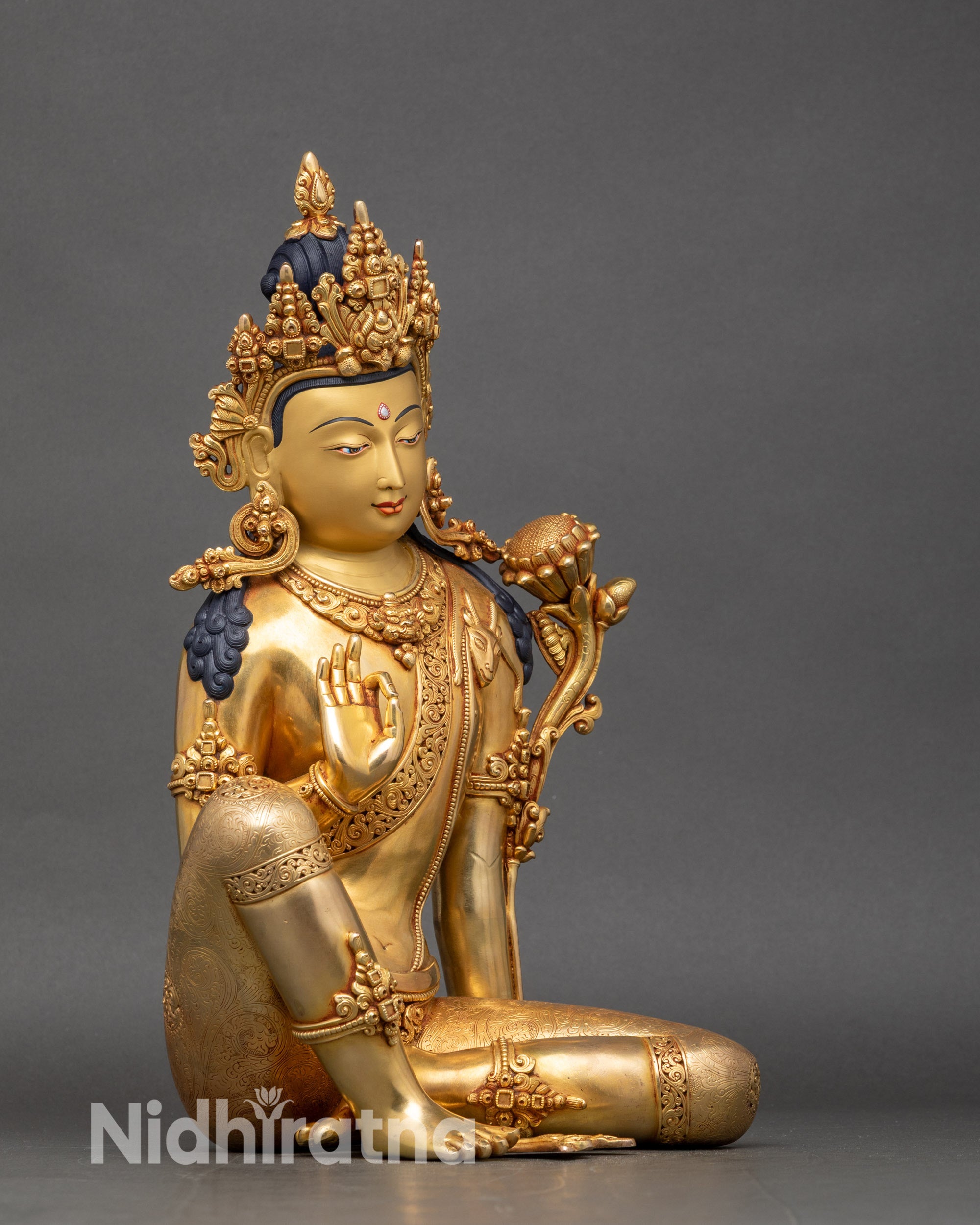 Right side view of Chenrezig Bodhisattva in lalitasana posture