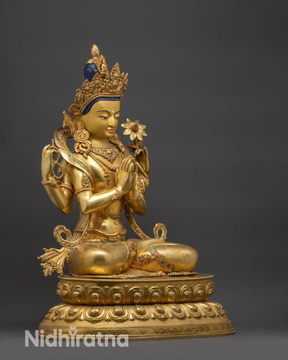 Right side view of Chenrezig Statue holding sacred objects in four hands
