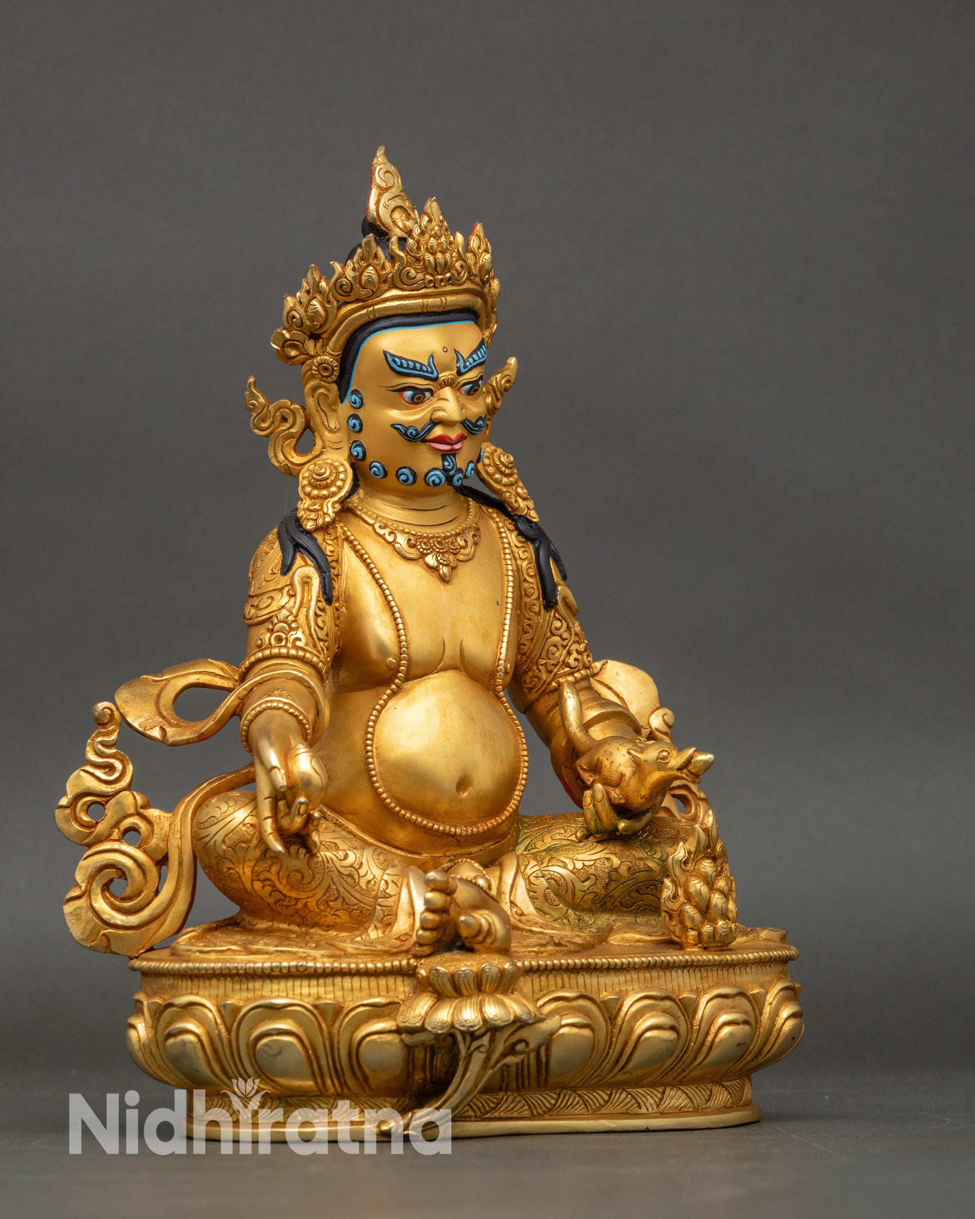 Right side view of Dzambhala wealth deity statue with jewel spitting mongoose
