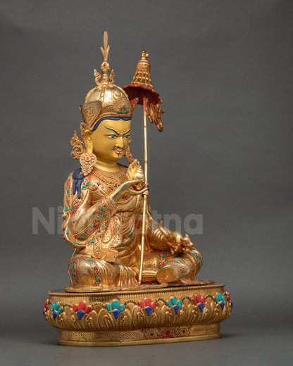 Right side view of Guru Norlha Statue highlighting hand-carved royal kasaya garments and semi-precious stones