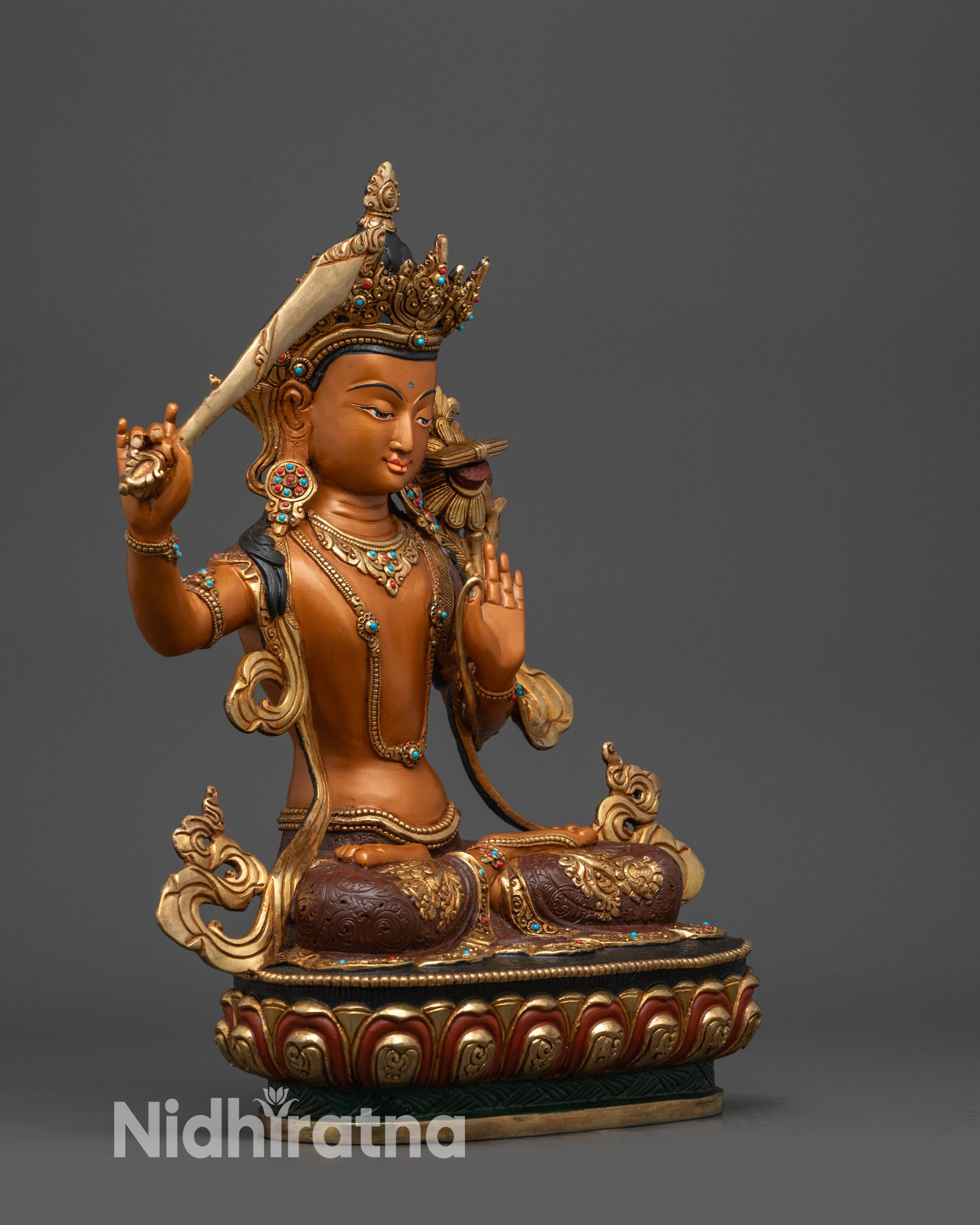 Right side view of Manjushri holding utpala flower and double-edged wisdom sword
