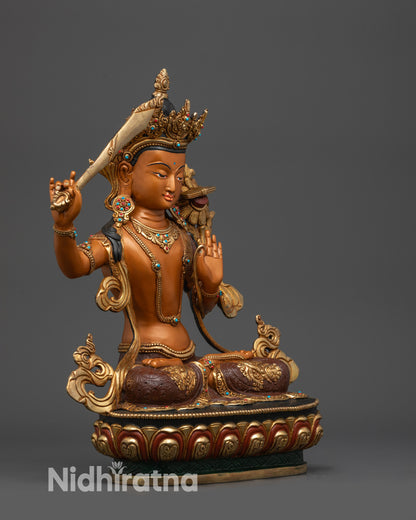 Right side view of Manjushri holding utpala flower and double-edged wisdom sword
