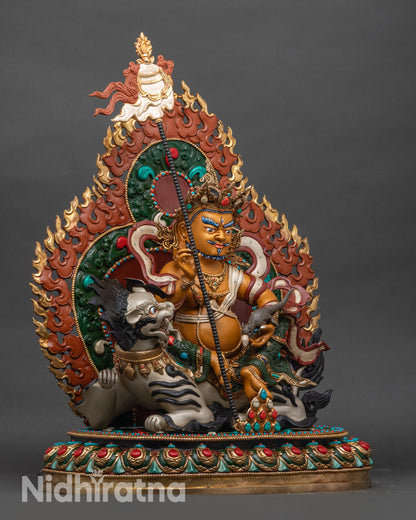 Right side view of Namtoshe Statue seated on lotus with ornate gold-gilded details