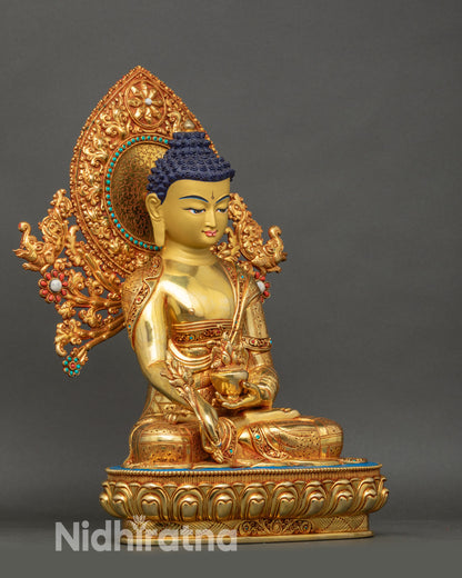 Right side view of Nepalese Medicine Buddha Statue, lotus seat and floral halo