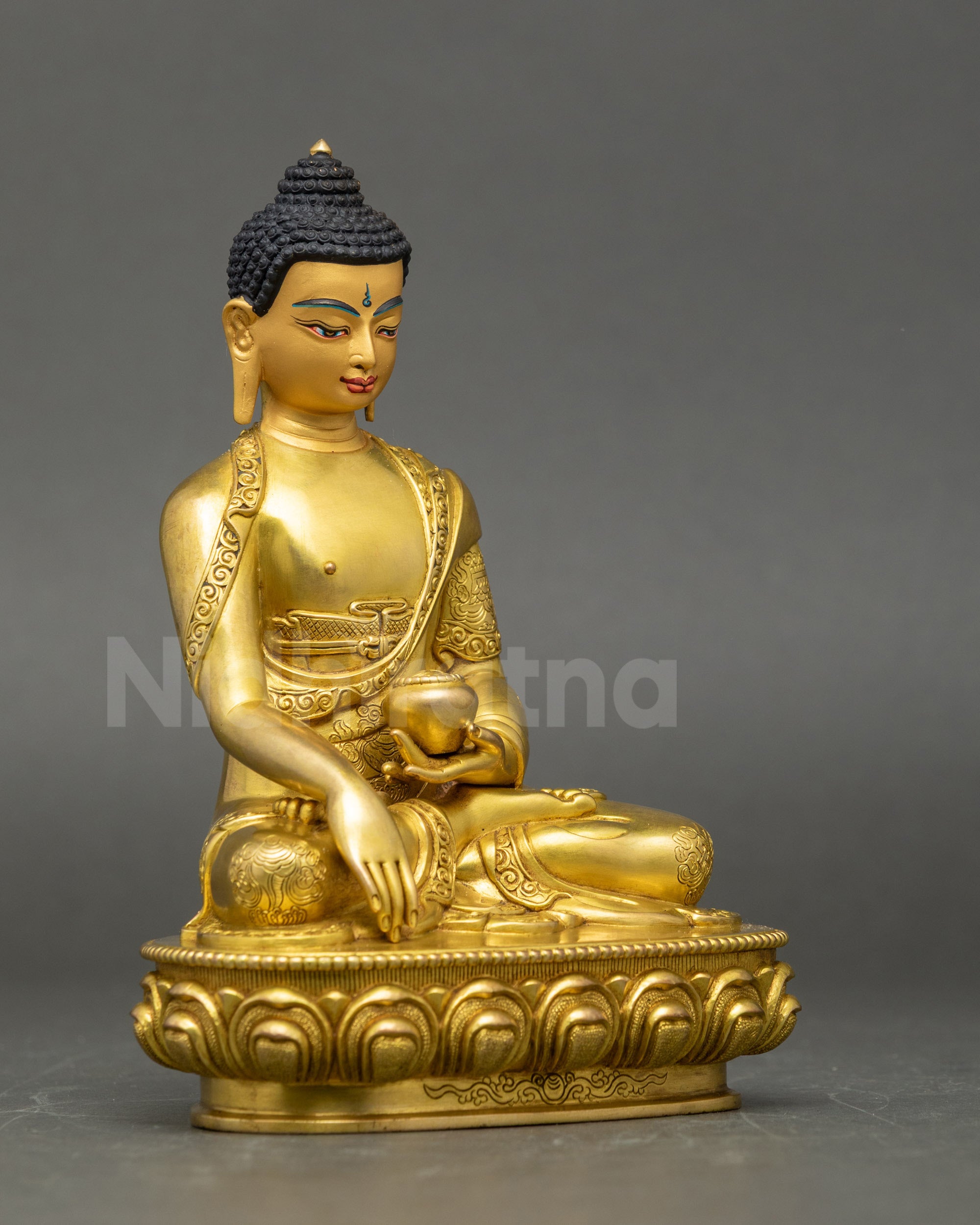 Right side view of Shakyamuni Buddha Statue highlighting flowing robes and features