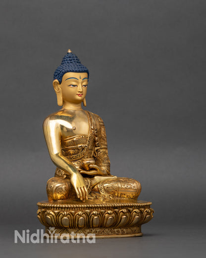 Right side view of Shakyamuni Buddha, holding alms bowl on lotus pedestal