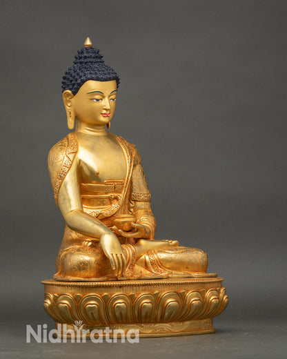 Right side view of Shakyamuni Buddha holding begging bowl on lotus pedestal