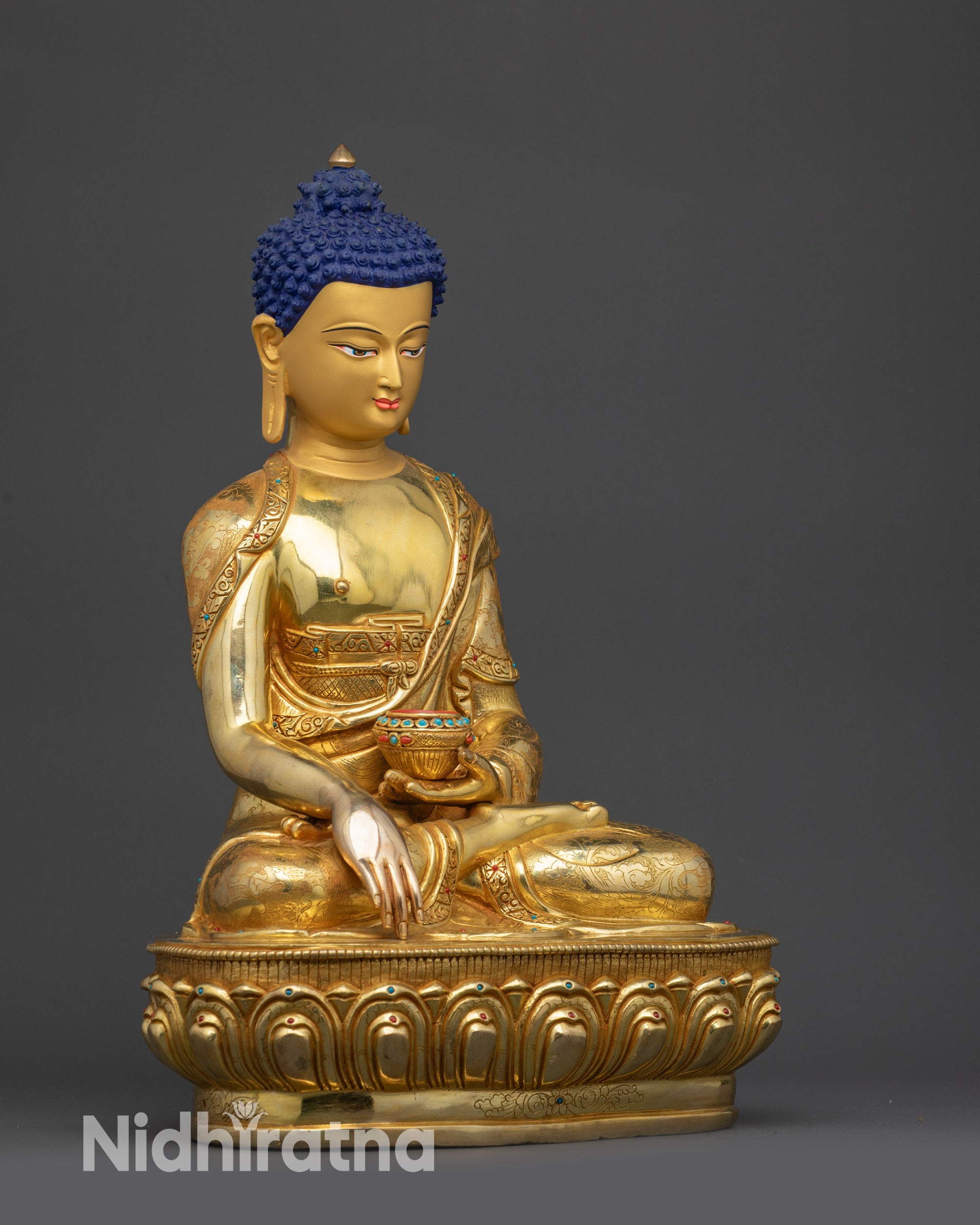 Right side view of Shakyamuni Buddha statue with gold fire-gilded base

