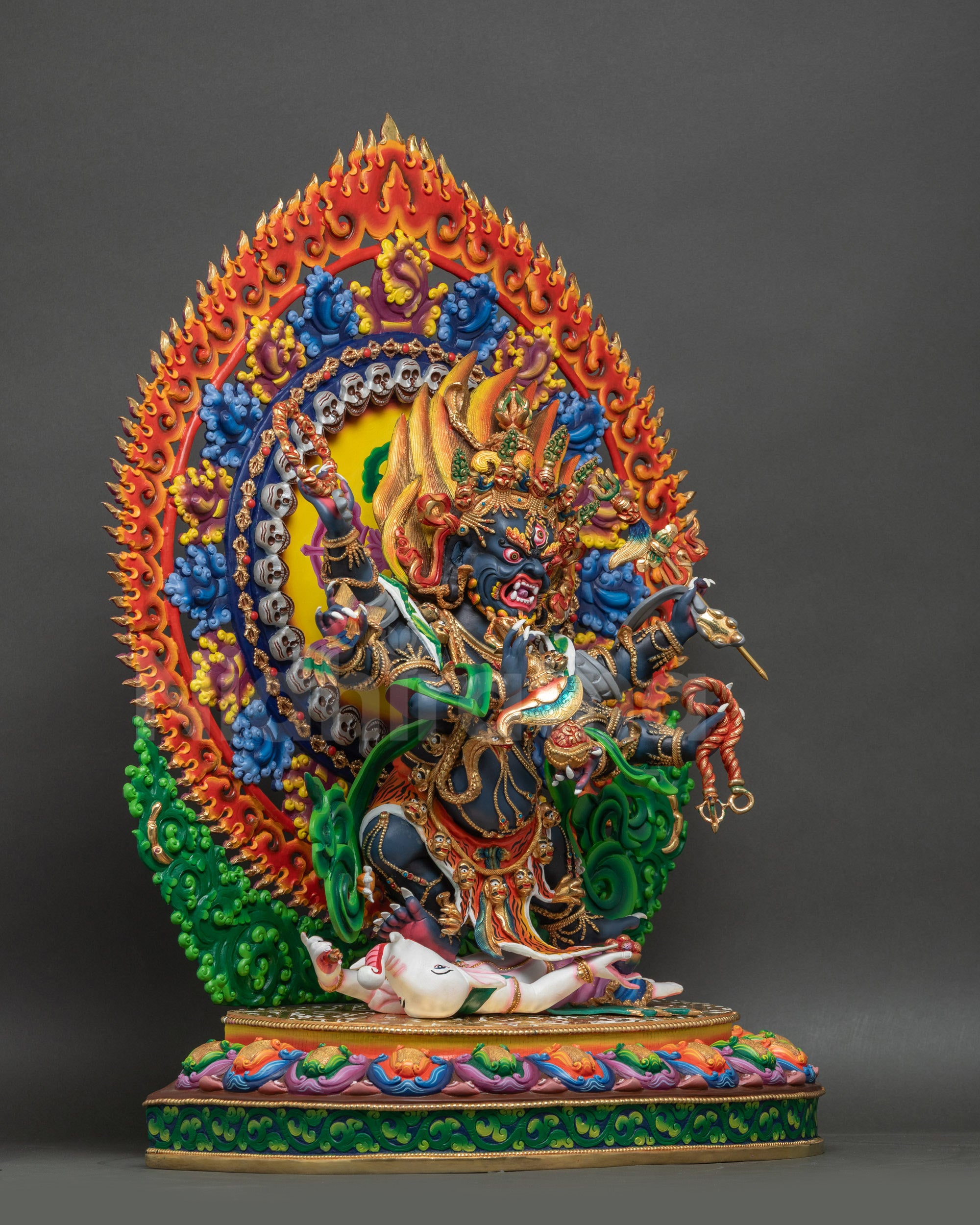 Right side view of Six-Armed Mahakala Statue displaying tiger-skin garment and divine attributes