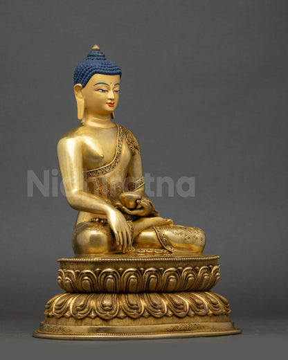 Right side view of Tathagata Buddha Shakyamuni statue seated in meditation on lotus base