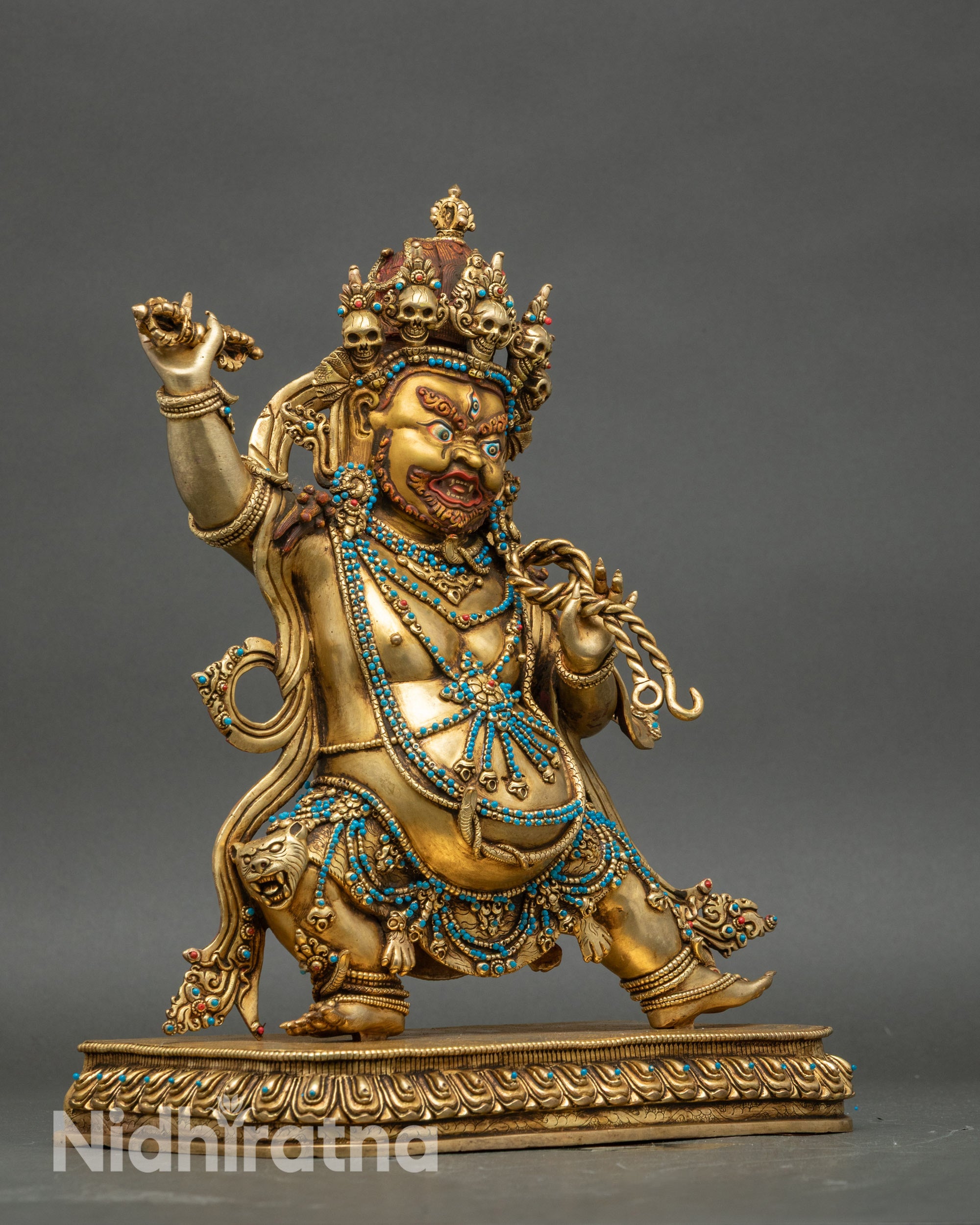 Right side view of Vajrapani statue, gold-gilded copper deity for spiritual devotion