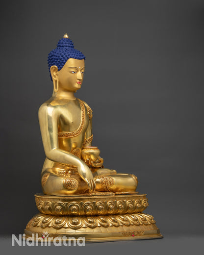 Right view Shakyamuni Buddha statue with gold Fire-gilded robes and lotus base
