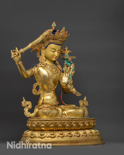 Right view side Manjushri Sculpture displaying lotus seat and sacred objects
