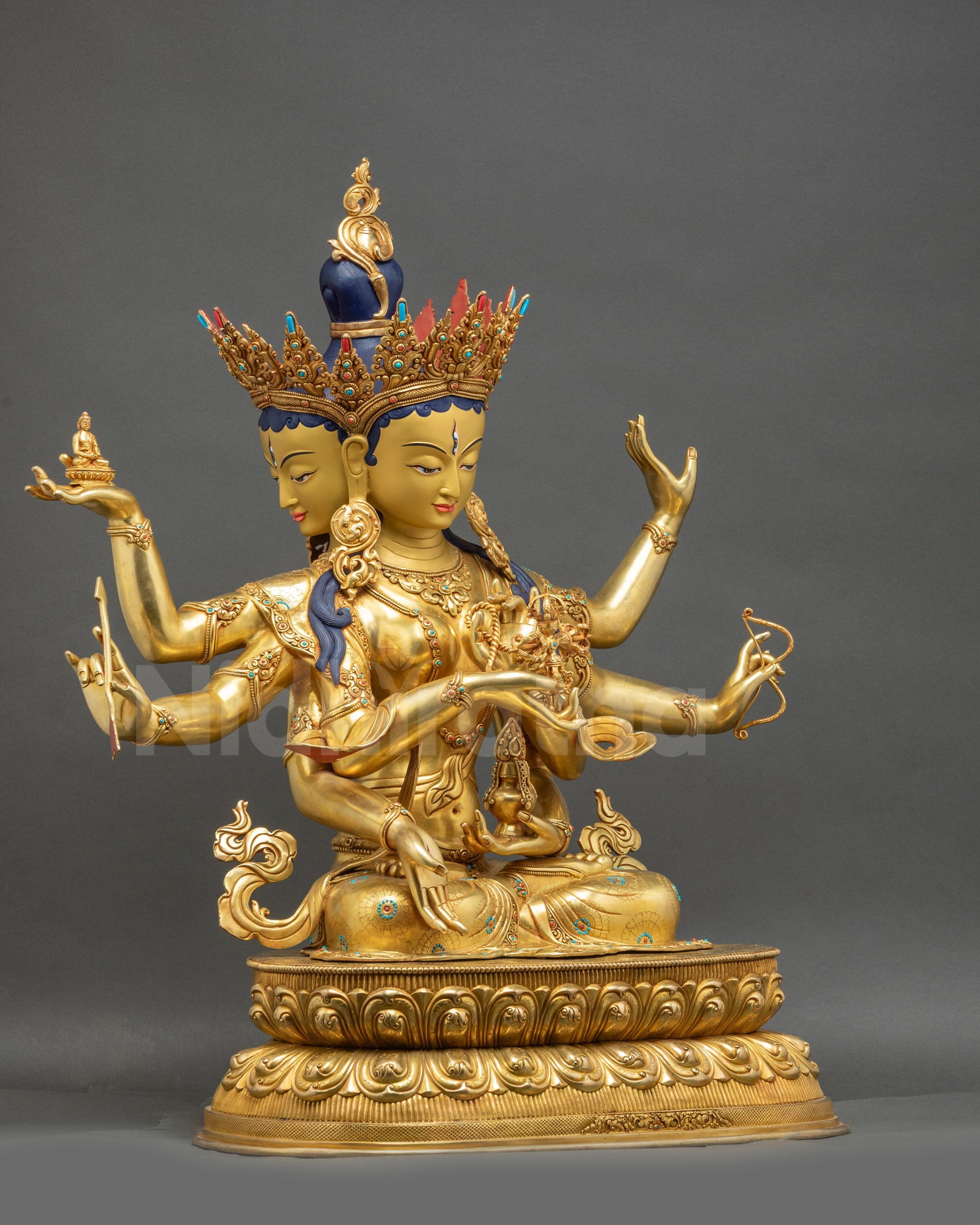 Right view side Namgyalma statue showing bow arrow vase and intricate copper carvings