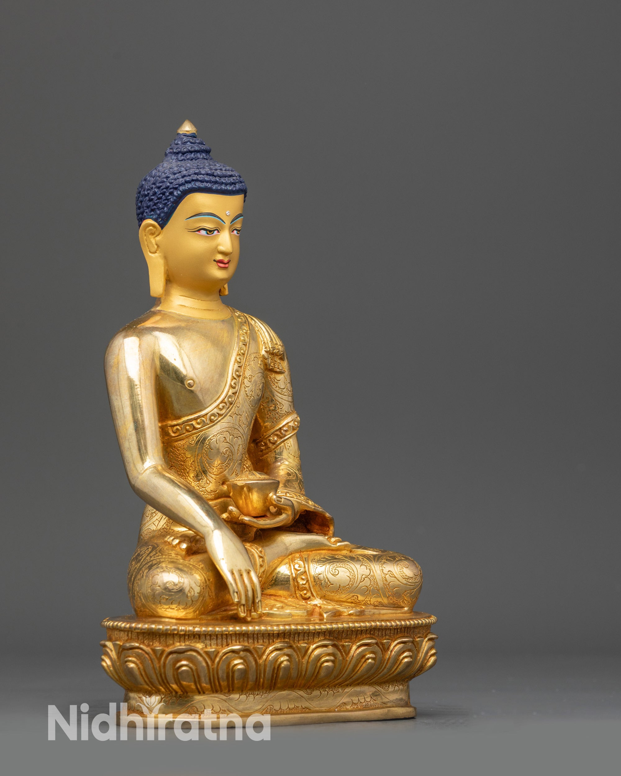 Right view side Shakyamuni Buddha statue with alms bowl and detailed lotus throne