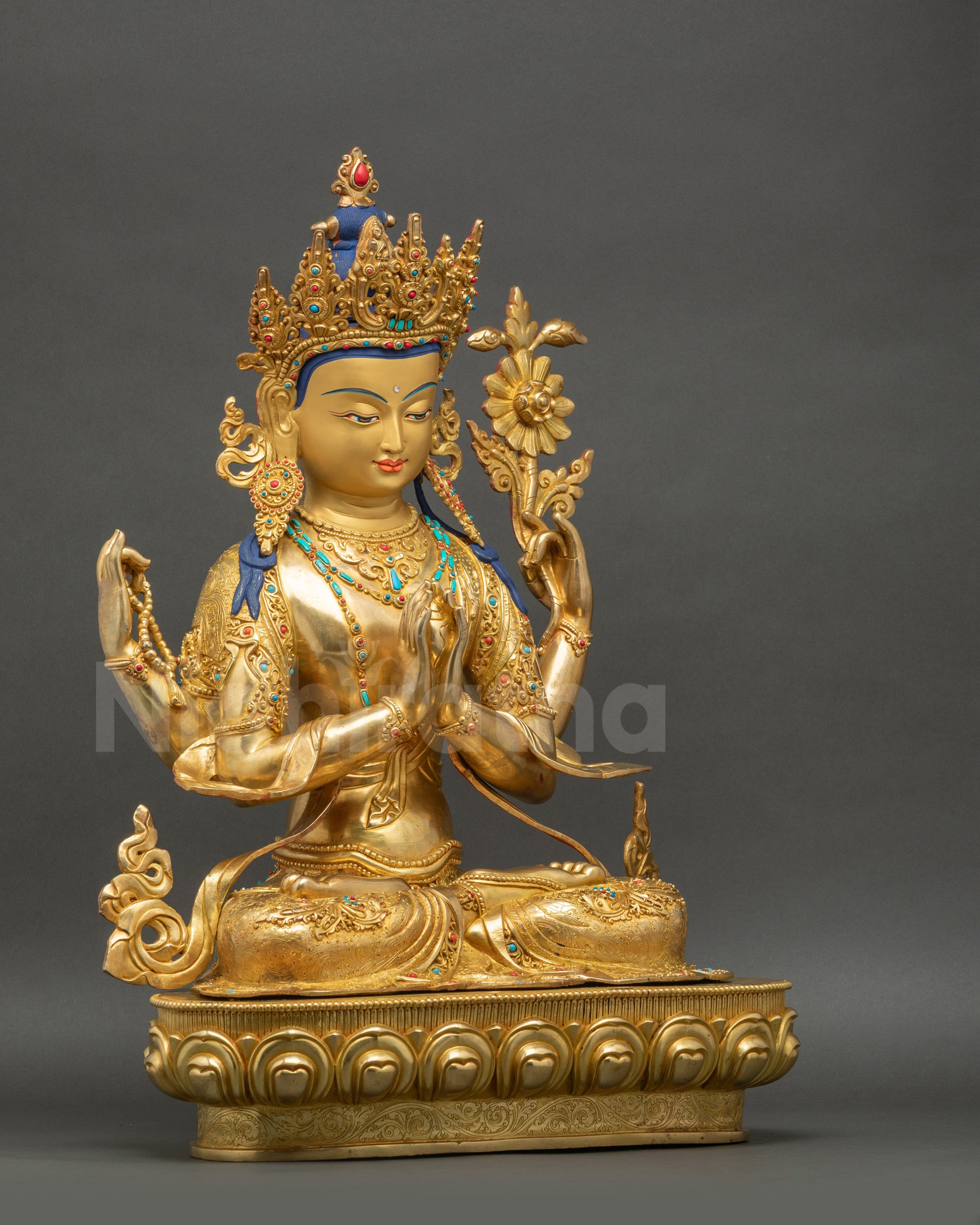 Right view side of Chenrezig Bodhisattva statue with lotus pedestal and gold ornaments