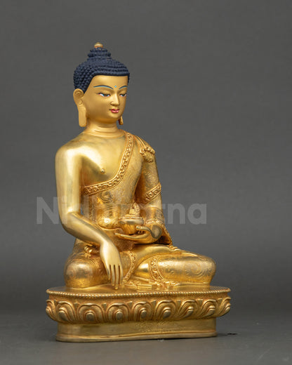 Right view side of Gautama Buddha sculpture, holding patra bowl in earth-touching mudra
