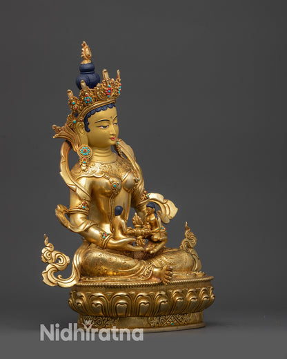 Right view side of Green Tara Statue, holding Vishva Vajra, crafted by master artisans
