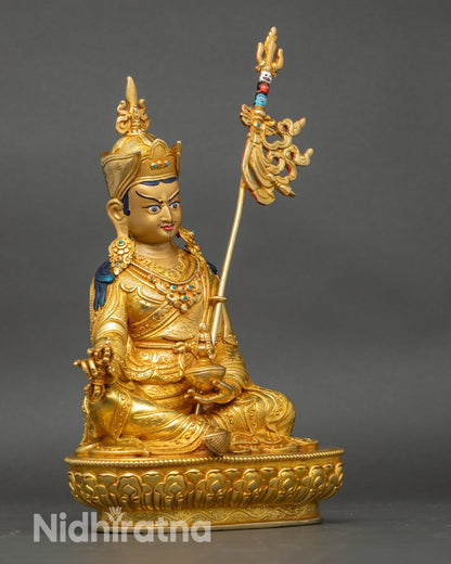 Right view side of Guru Padmasambhava sculpture with lotus seat and gold finish
