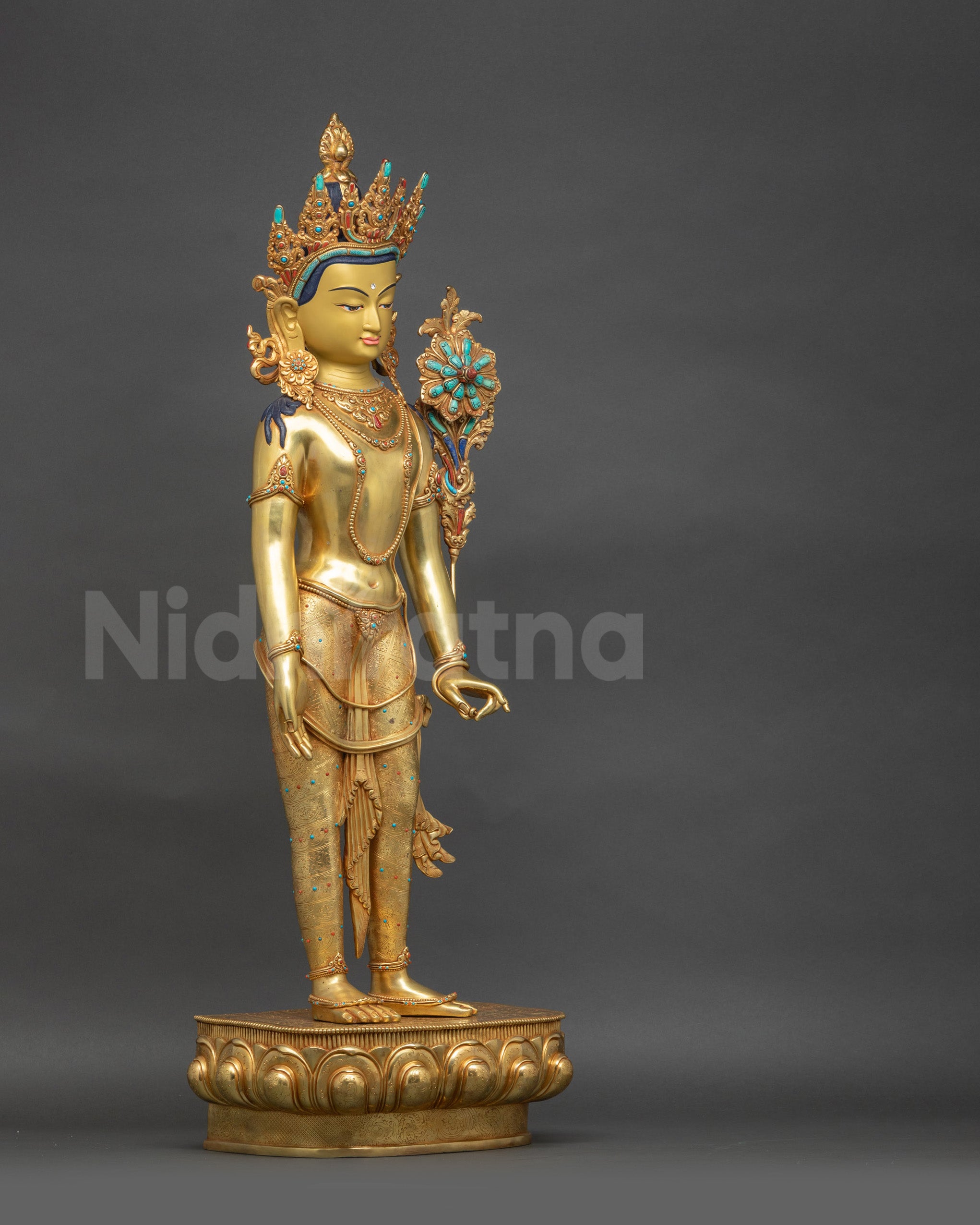 Right view side of Lotus-Bearer Padmapani standing sculpture with semi-precious adornments