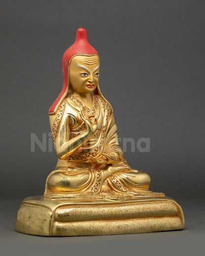 Right view side of Santarakshita holding Vajrayana texts