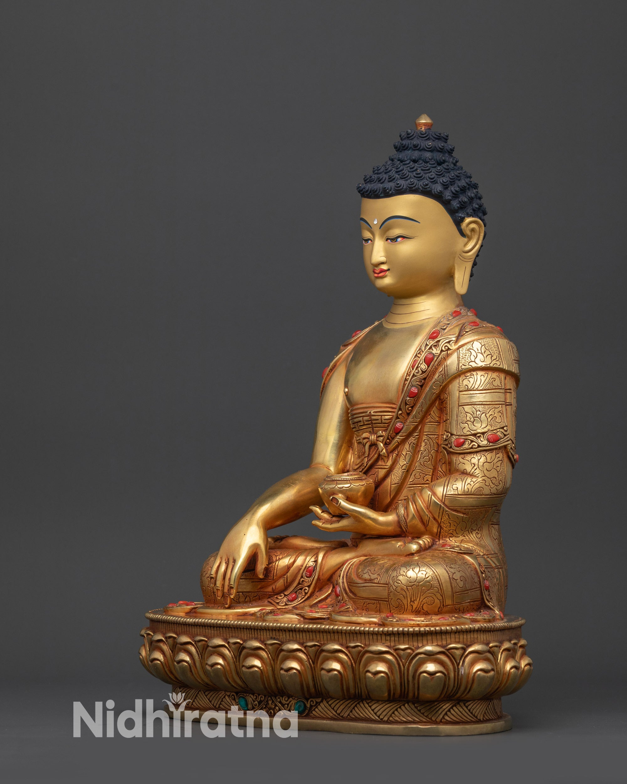 Right view side of Shakyamuni Buddha meditation statue with patra bowl
