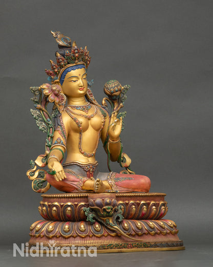 Right view side of Yellow-hued Shyama Tara figurine with lotus pedestal and floral robes