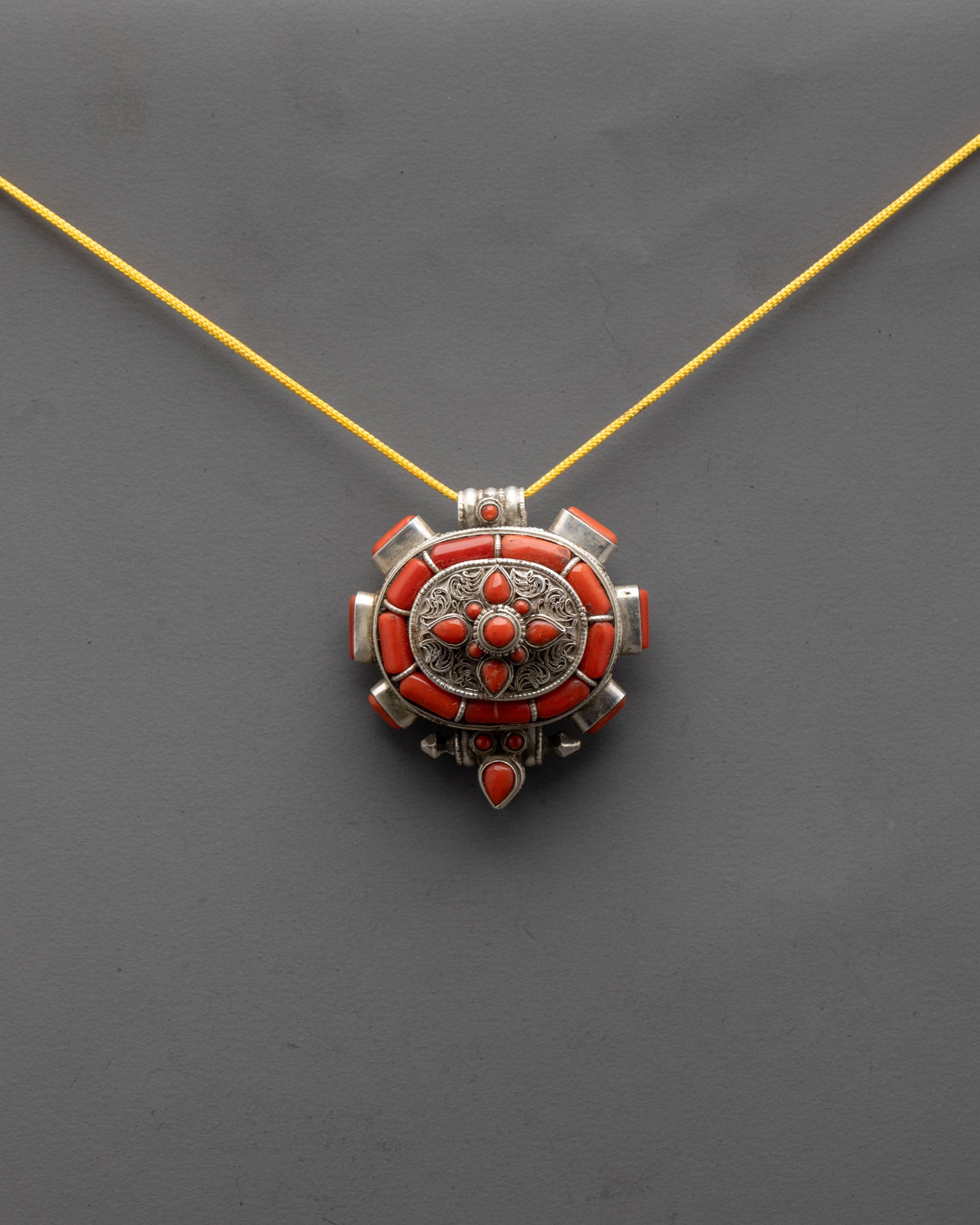 Red Coral Stone Pendant front view with intricate silver filigree and coral stones
