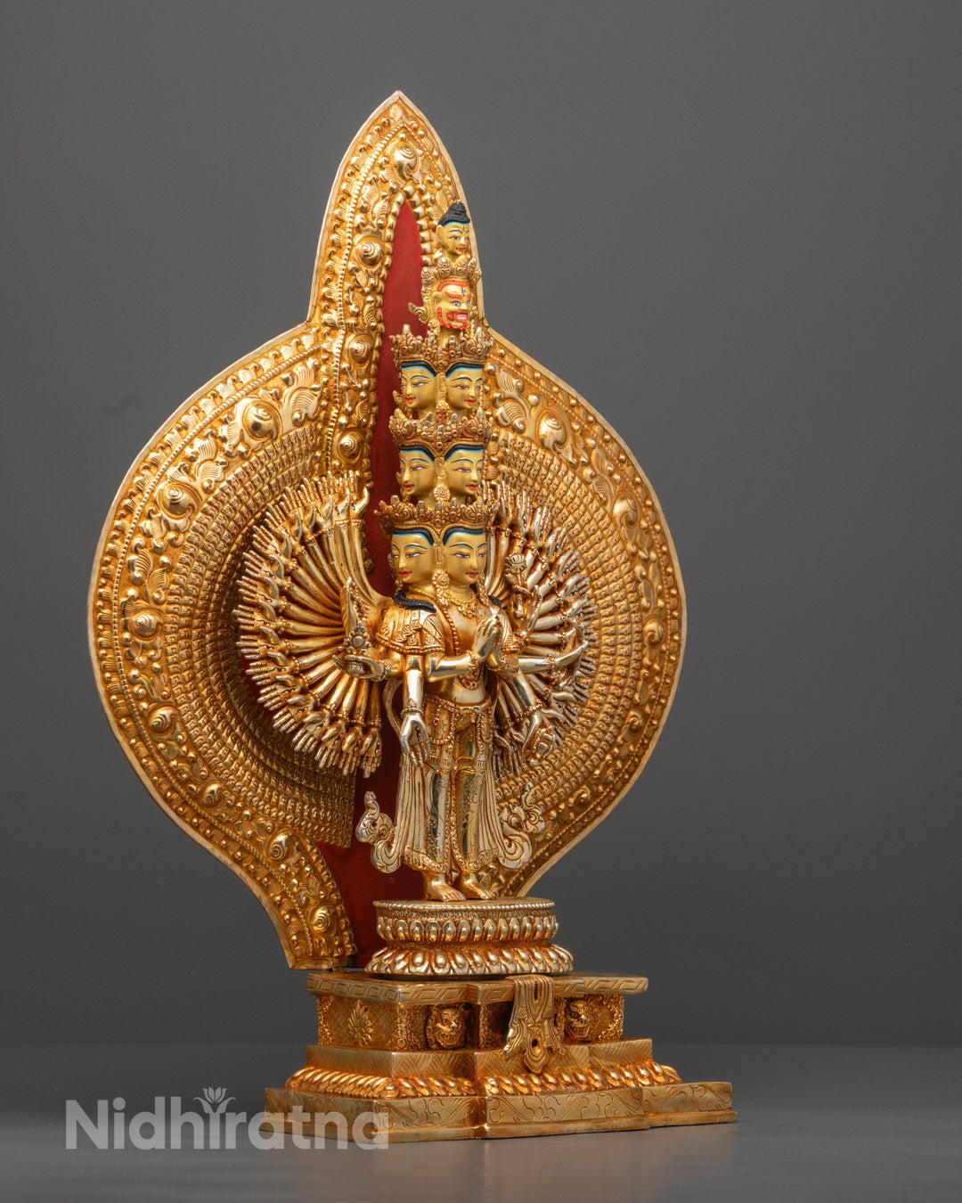 Sacred Avalokiteshvara Buddha statue with 1,000 arms and eyes in each palm, representing infinite wisdom and the ability to relieve suffering