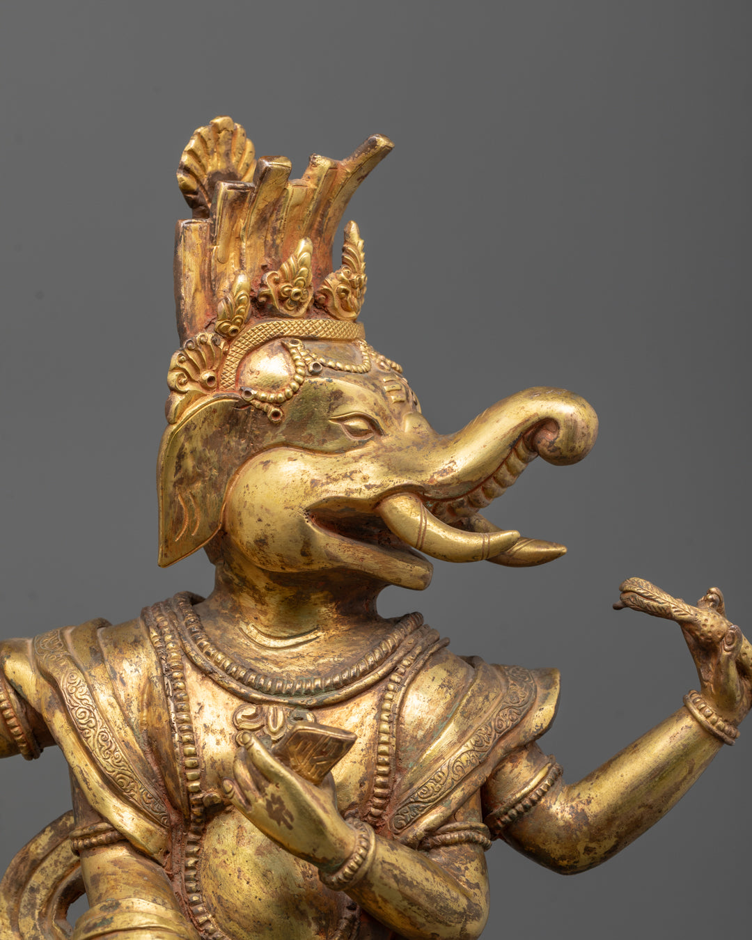 Sacred Four-Armed Ganesha Sculpture Crafted in Nepal with Mouse Mount


