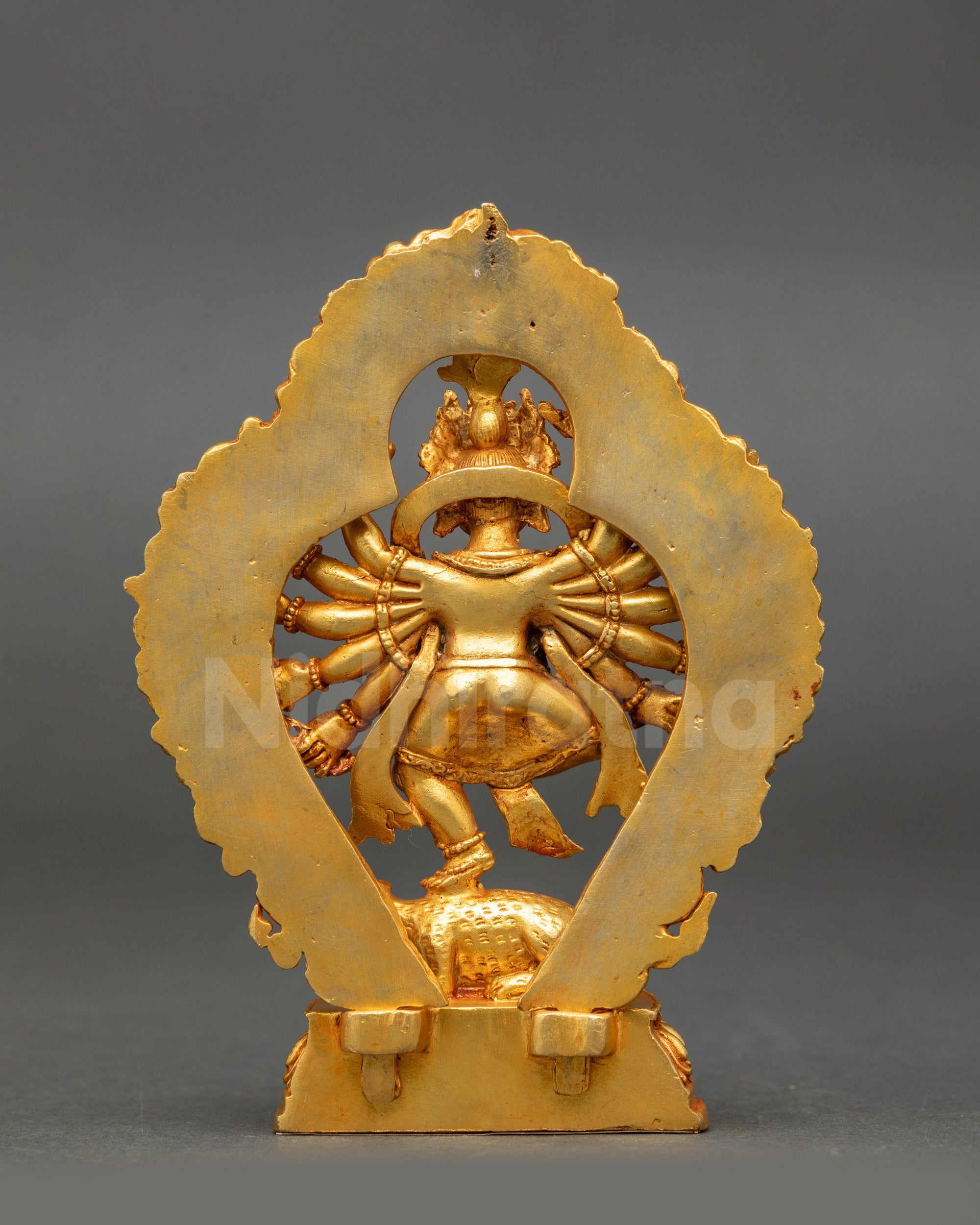 Sacred Hindu Ganesh statue seated on lotus with detailed crown and symbolic attributes