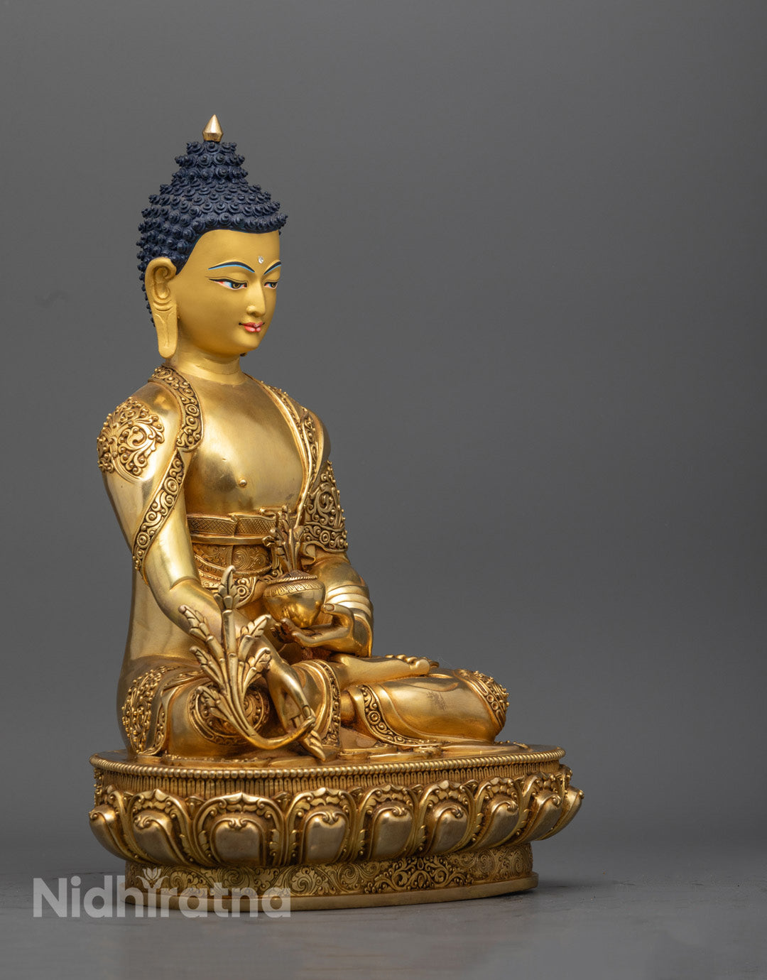 Beautifully hand-carved Medicine Buddha statue with a 24K gold face, offering divine healing energy and spiritual peace.