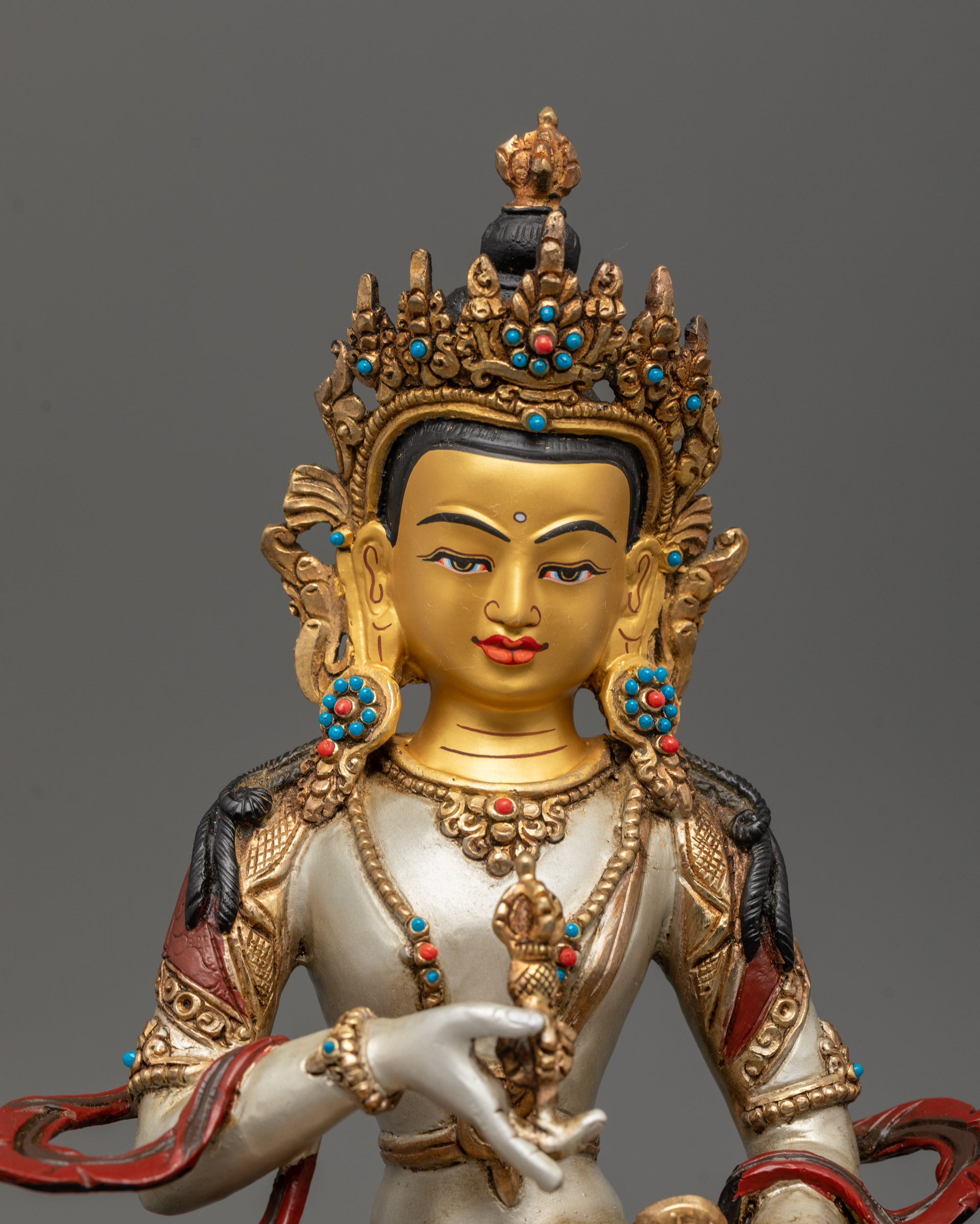 Sacred Vajrasattva Buddhist statue holding vajra and bell, symbolizing wisdom