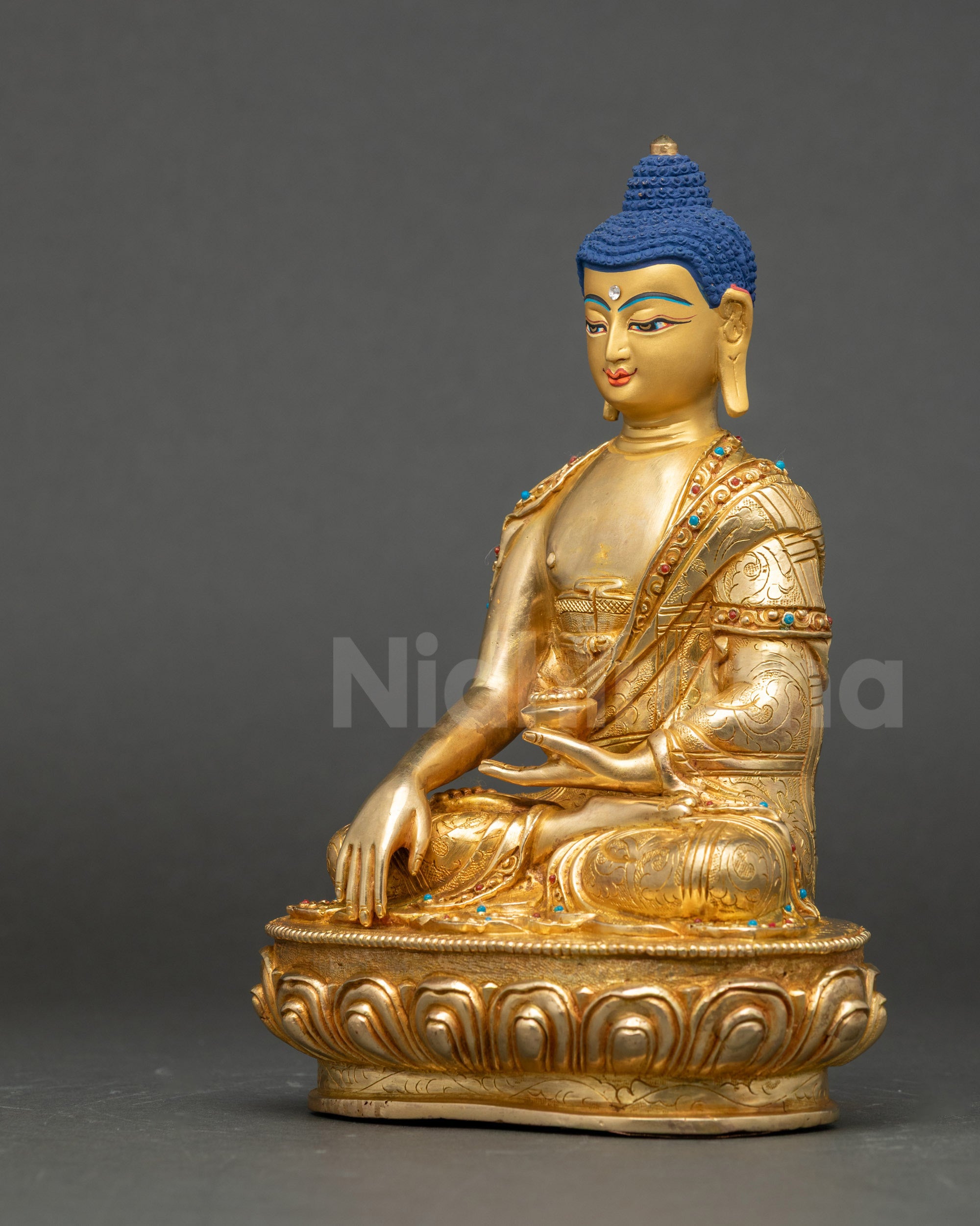 Sakyamuni Buddha left side view intricate carvings and semi-precious stones