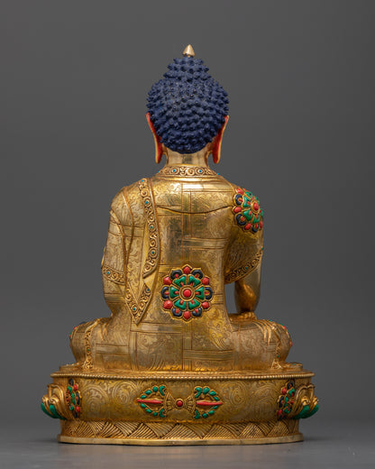 Sakyamuni Buddha statue full view, traditional Nepalese Buddhist icon with radiant gold finish