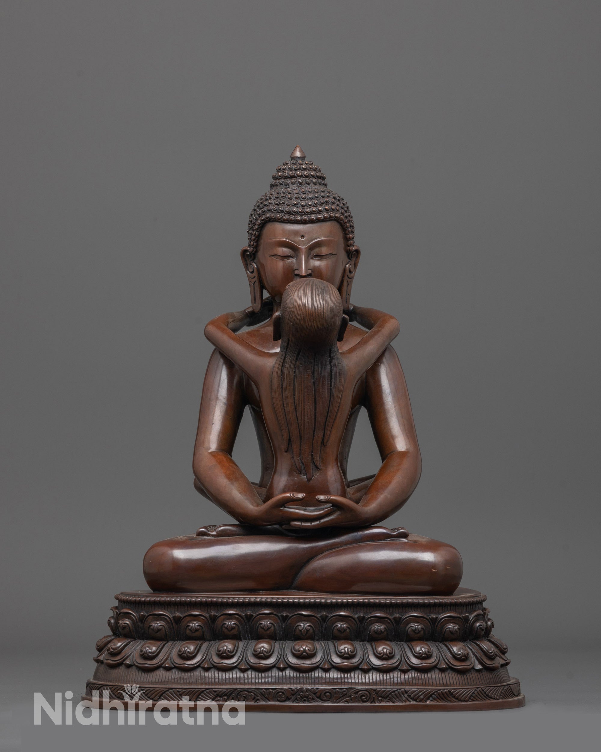 front view of oxidized samantabhadra statue and detailed tantric embrace