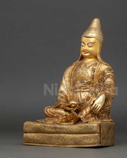 Santaraksita statue left side view detailed robe and ritual bowl