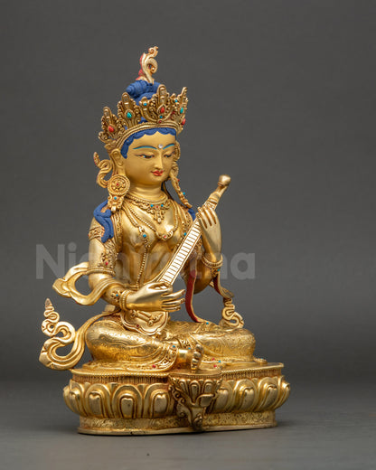 Saraswati statue right view side showing royal ease posture and flowing ornaments