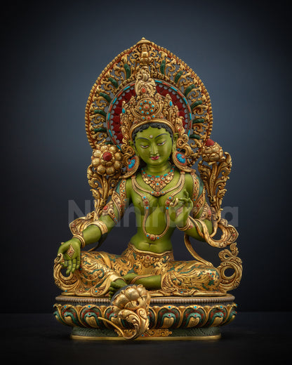 Full front view of Savior Shyama Tara statue seated in lalitasana posture on lotus pedestal with serene expression