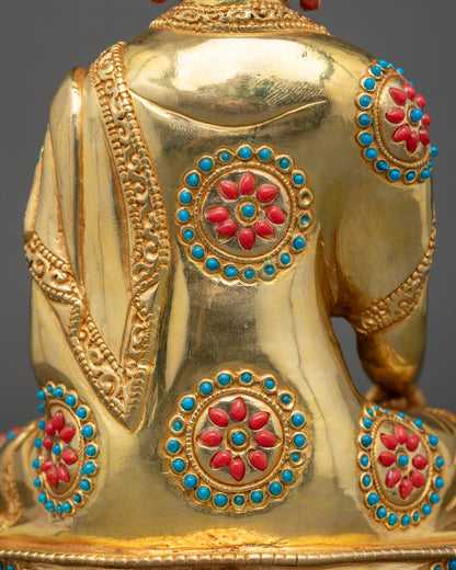Semi-precious stones and gold-gilding on Shakyamuni Buddha sculpture, spiritual decor