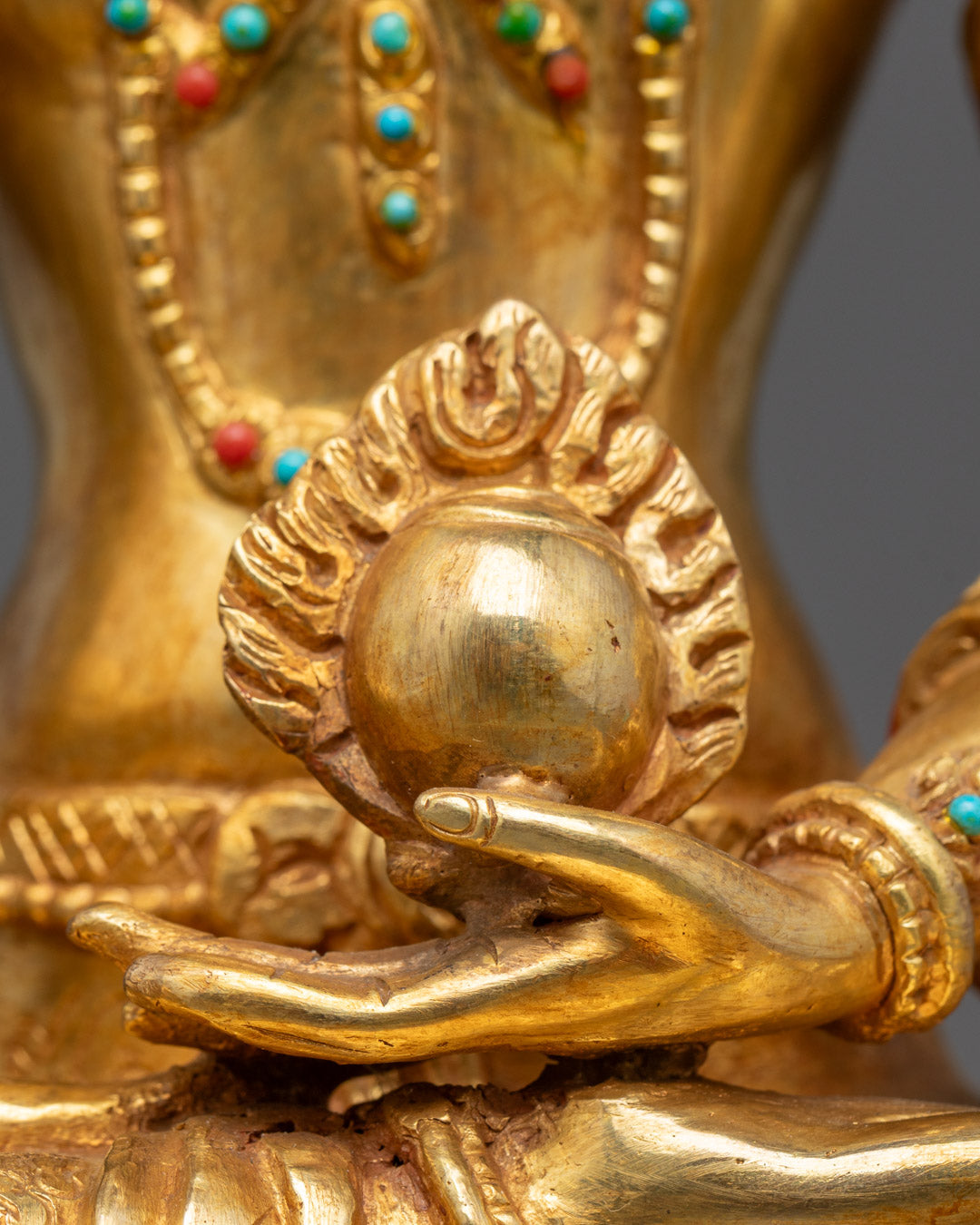 Serene Ksitigarbha statue seated peacefully on lotus base