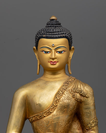 Serene face of Amitabha Buddha statue with intricate gold gilding and turquoise-inlaid eyes, radiating infinite light and compassion