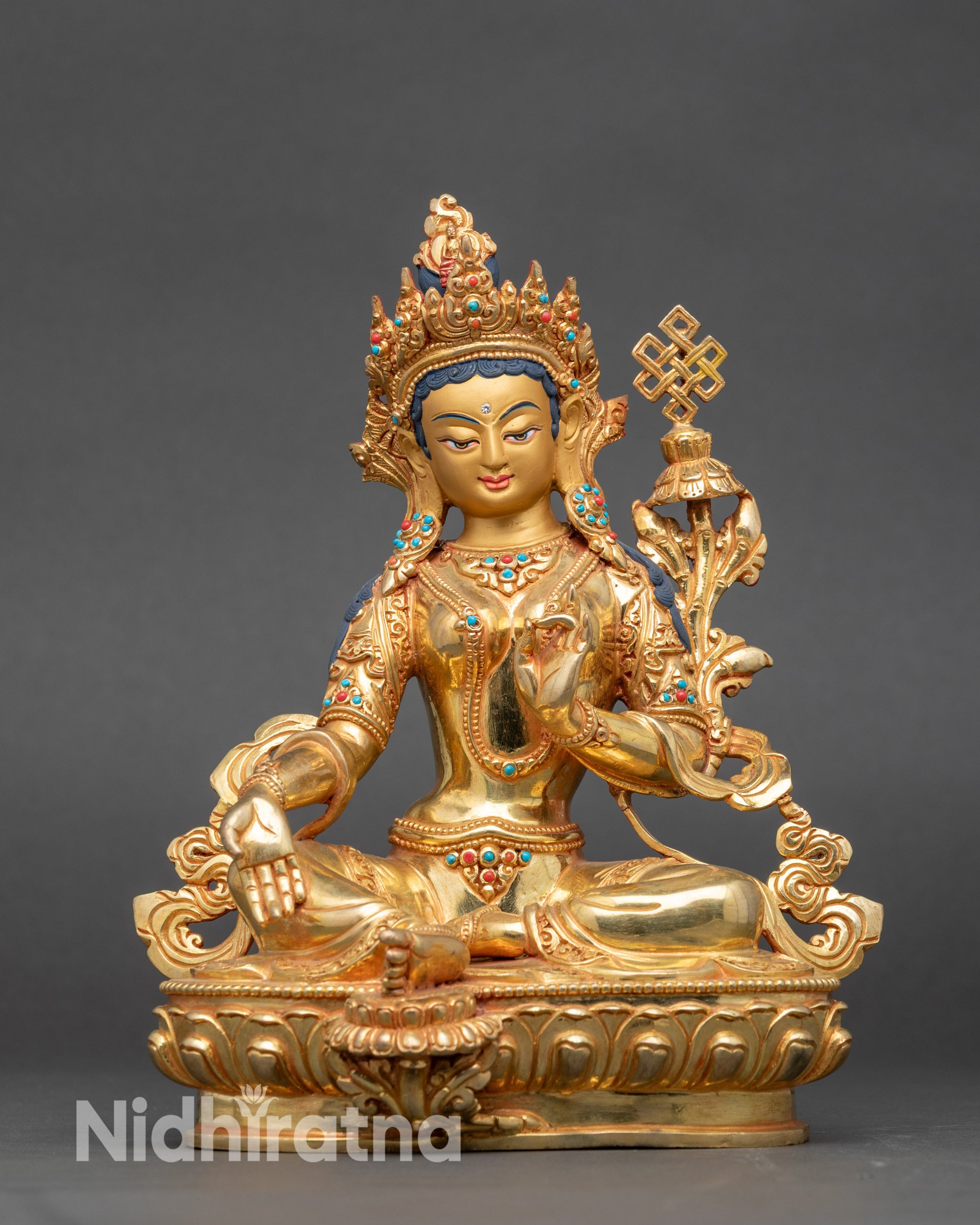 Sermo Sönam Tobkyé face close up, gold fire-gilded detailing on facial features