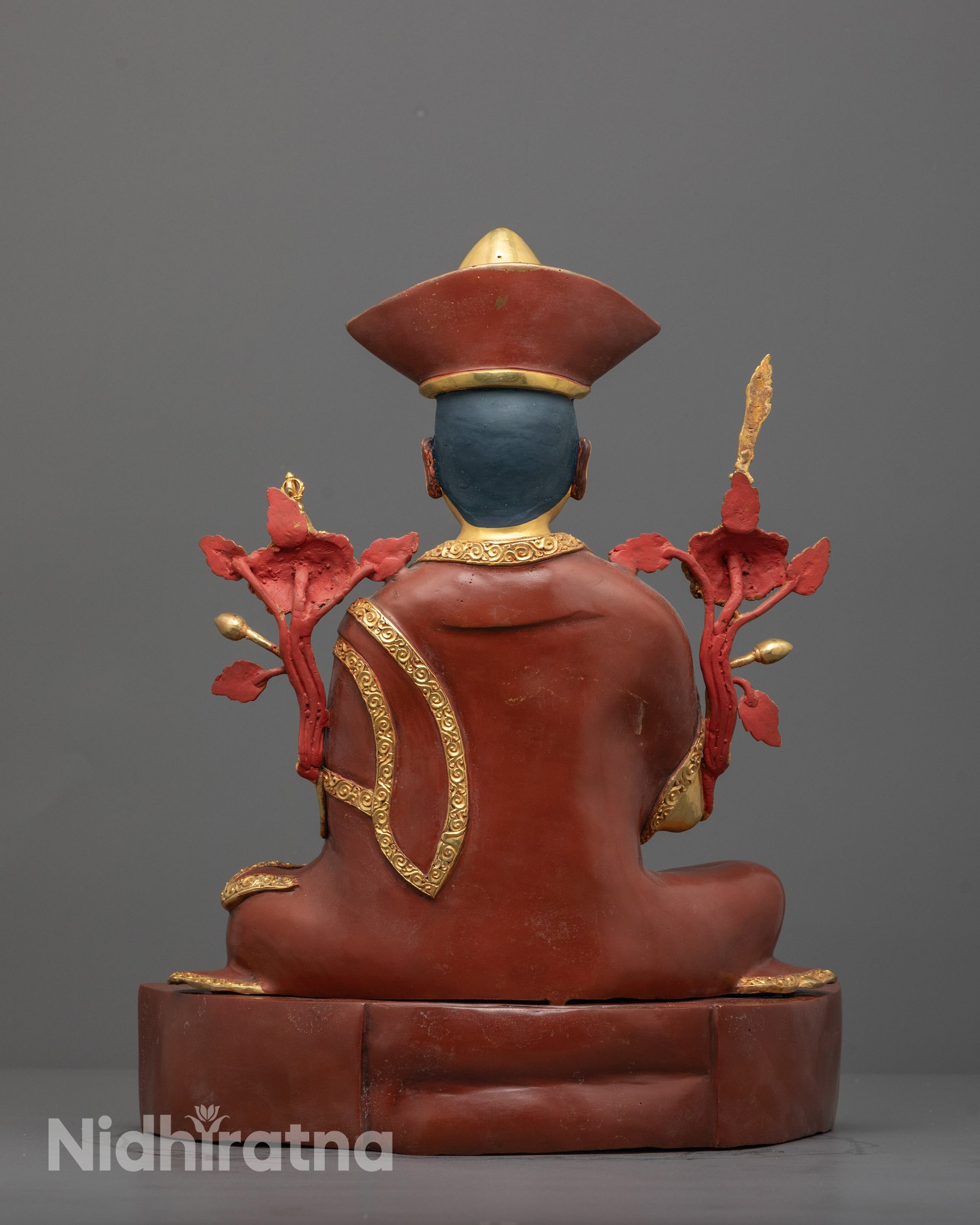 back view of handcrafted nyamme sherab gyaltsen statue with copper base and robe statue
