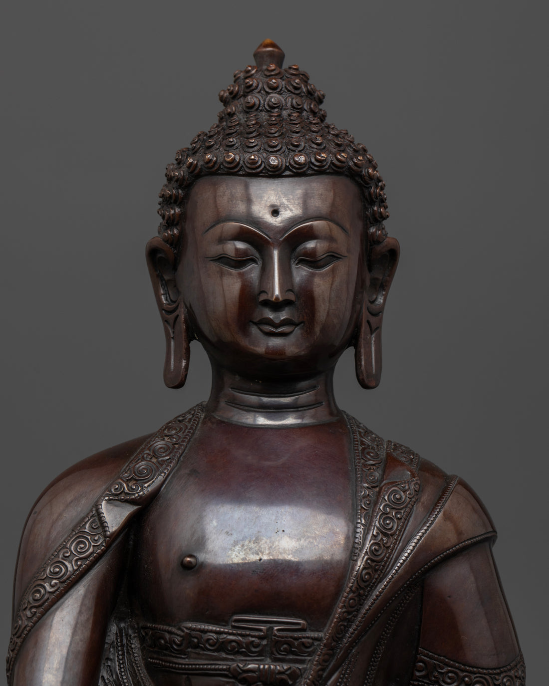 shakyamuni buddha statue oxidized face