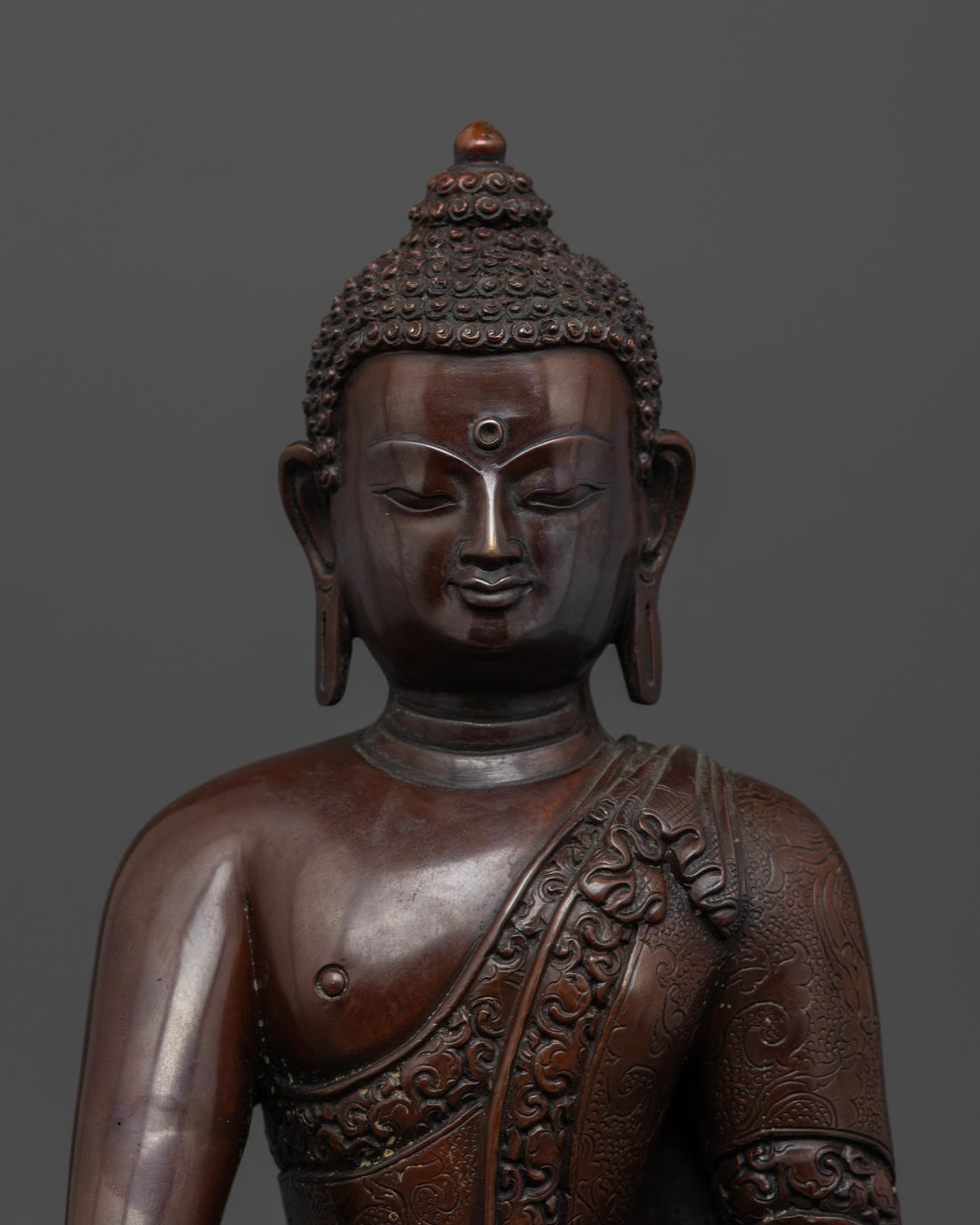 face of oxidized buddha statue