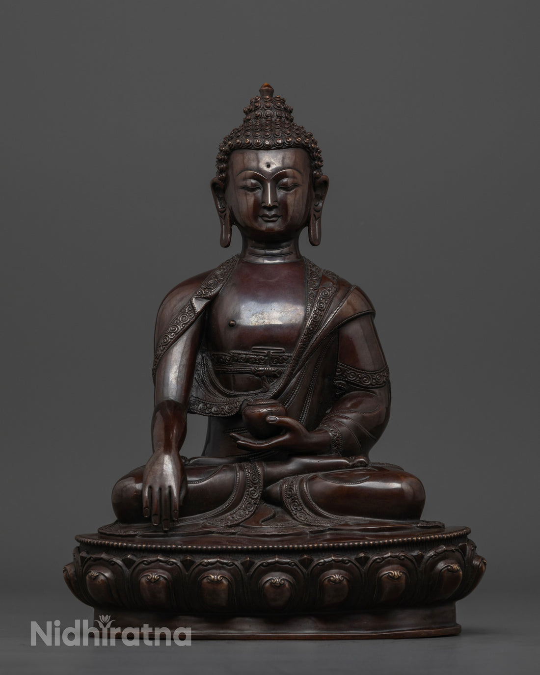 oxidized brown shakyamuni buddha statue